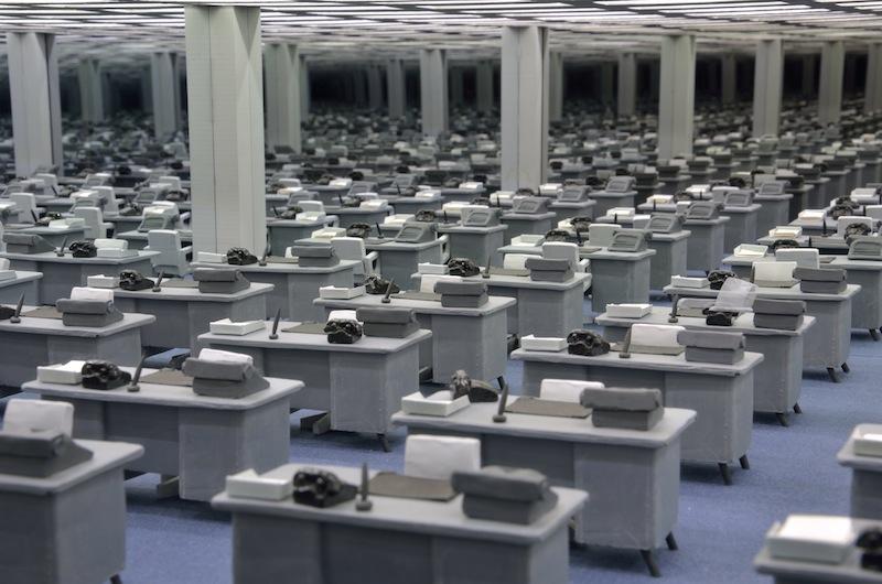 The Museum of Arts & Design has a trippy-intriguing show devoted to miniatures. Shown here: David Lawrey and Jaki Middleton's 'Consolidated Life,' a diorama of an office that seems to extend forever.